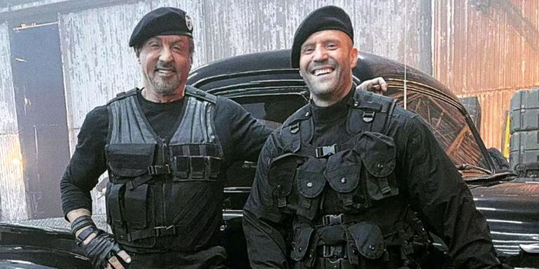 Sylvester Stallone and Jason Statham smile behind the scenes of Expendables 4.