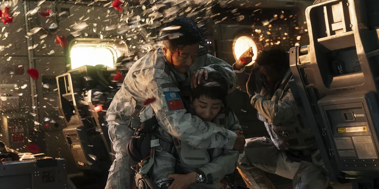 Astronaut take cover from an explosion in The Wandering Earth 2