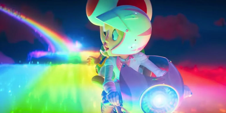 Peach and Toad riding down Rainbow Road in The Super Mario Bros Movie.