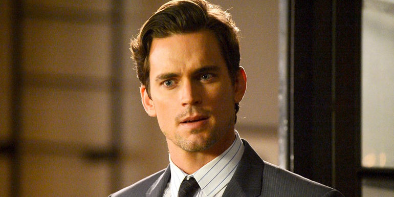 Matt Bomer wearing a suit in White Collar