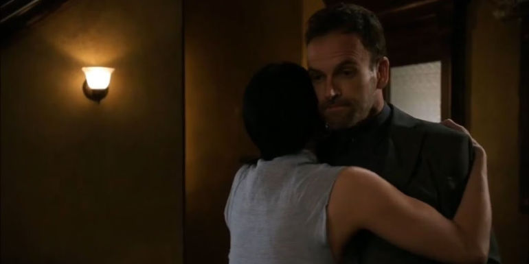 Sherlock and Joan Hugging in Elementary