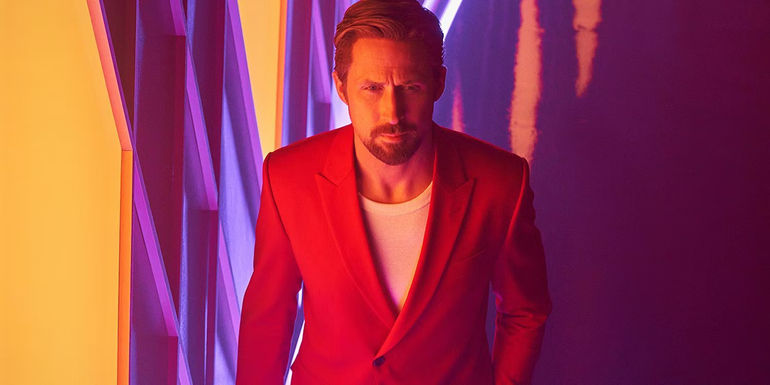 Six (Ryan Gosling) in a red suit under neon lighting in The Gray Man.