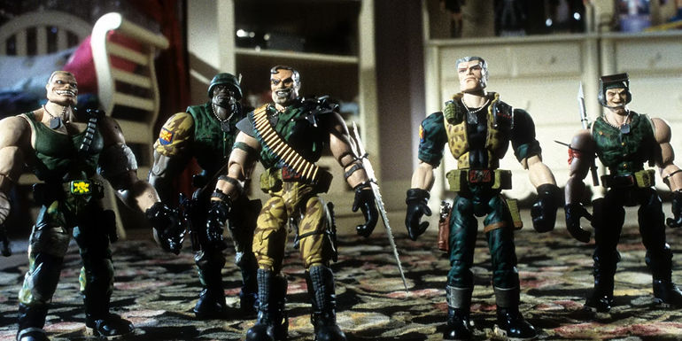 The Commando Elite stand on a bedroom floor in Small Soldiers 1998