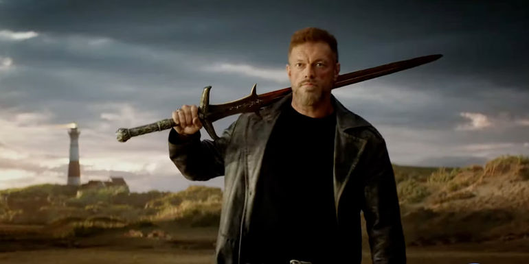 Adam Copeland as Ares holding a long sword in Percy Jackson and the Olympians.