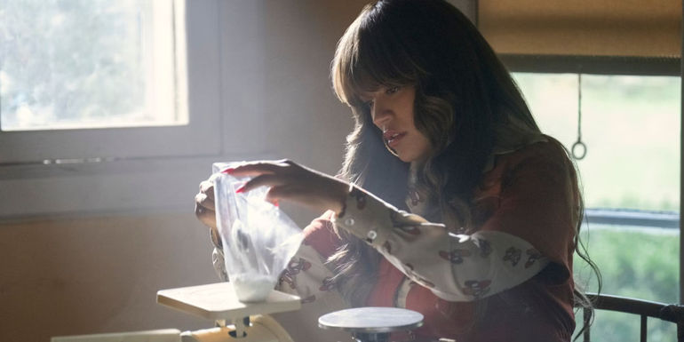 Carla using scales in Griselda