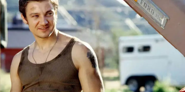 Brian (Jeremy Renner) smiling in S.W.A.T.