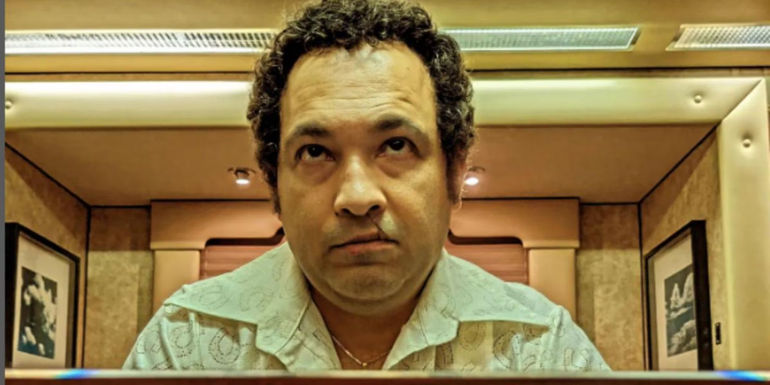 Papo Meija at a desk in Griselda