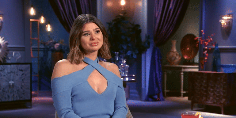 Raquel Leviss vanderpump rules wearing blue shirt looking concerned