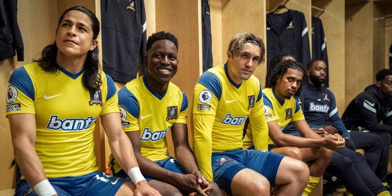 AFC Richmond players in yellow jerseys in Ted Lasso