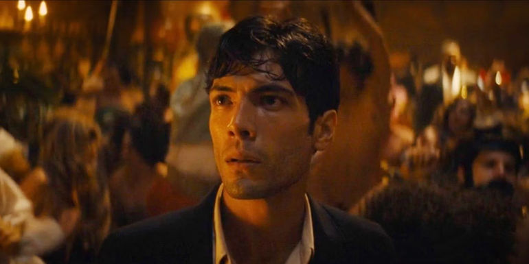 Diego Calva as Manny at a party in Babylon.