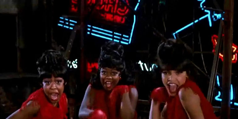 The trio singing on the rooftop in Little Shop of Horrors. 