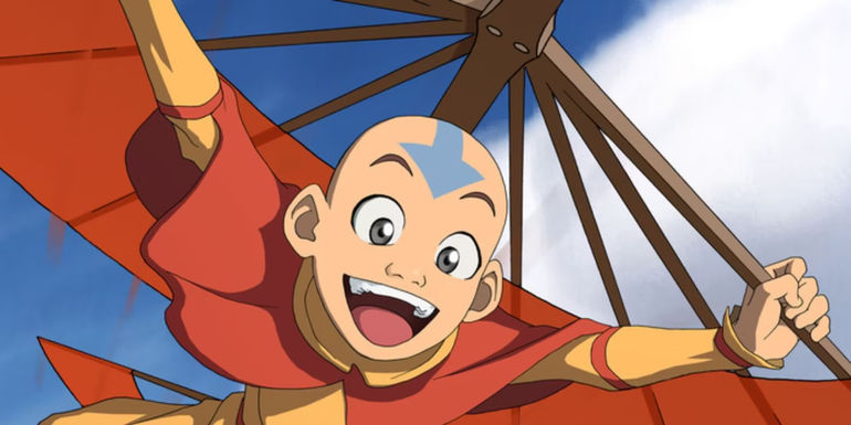 Aang flying through the air on a paraglide in Avatar the last airbender