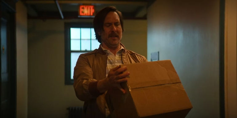 Gabe holding the box containing Medusa's head in Percy Jackson episode 8