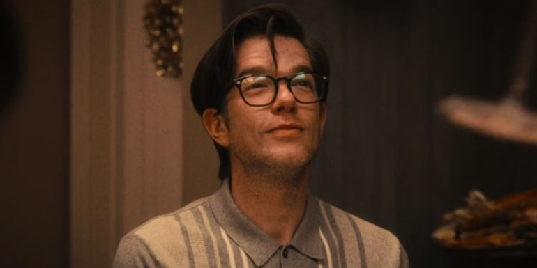 John Mulaney as Steven at the dinner table in The Bear season 2.