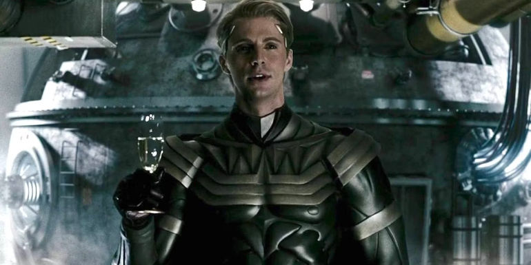 Ozymandias in his costume toasting with a glass of champagne in Watchmen