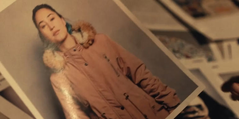 Danvers looking at Annie Masu Kowtok's picture in True Detective season 4