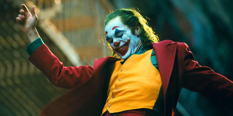 Joaquin Phoenix as Arthur Fleck Dancing Down Stairs In Joker