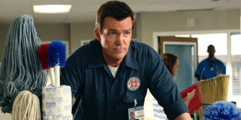Neil Flynn as The Janitor with cleaning supplies in Scrubs