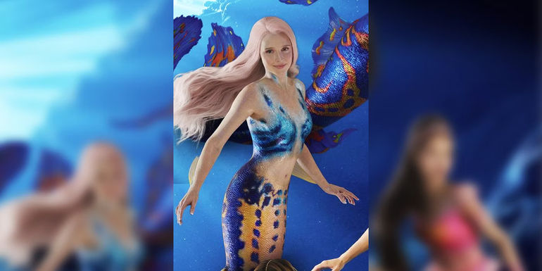 Nathalie Sorrell as Caspia with blue fins and scales in the live action The Little Mermaid