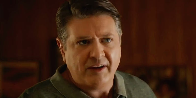 A close-up of George Cooper from Young Sheldon.