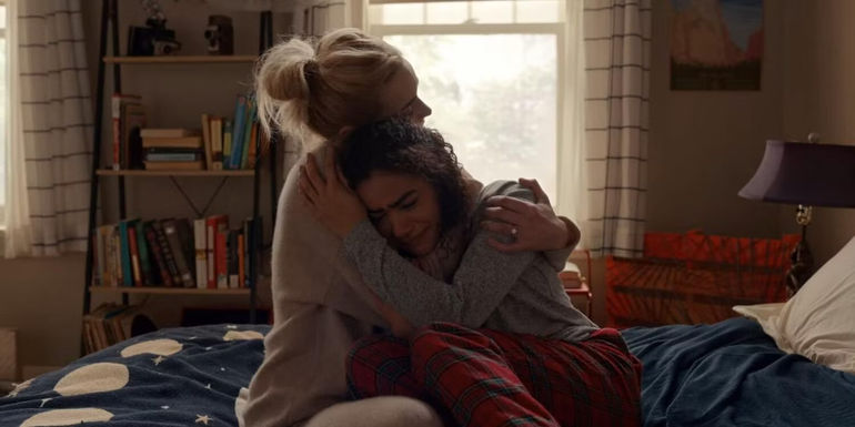 Georgia (Brianne Howey) hugging a crying Ginny (Antonia Gentry) in Ginny & Georgia season 2.