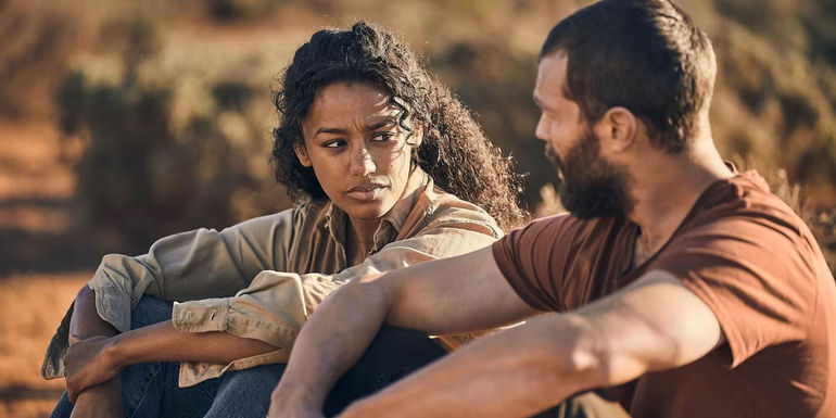 Shalom Brune-Franklin and Jamie Dornan chat in The Tourist season 1