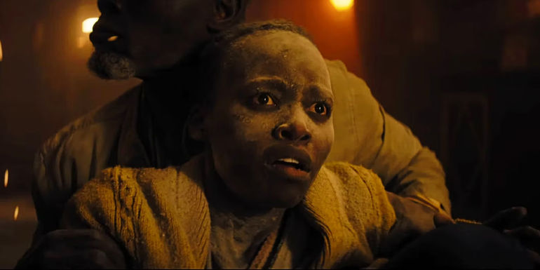 Lupita Nyongo looking terrified in A Quiet Place Day One