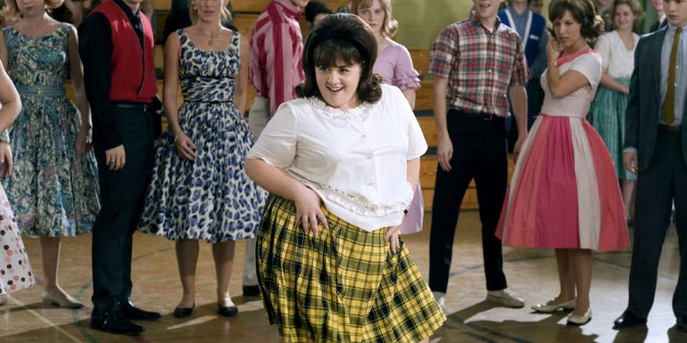 Tracy dancing in the gym in Hairspray