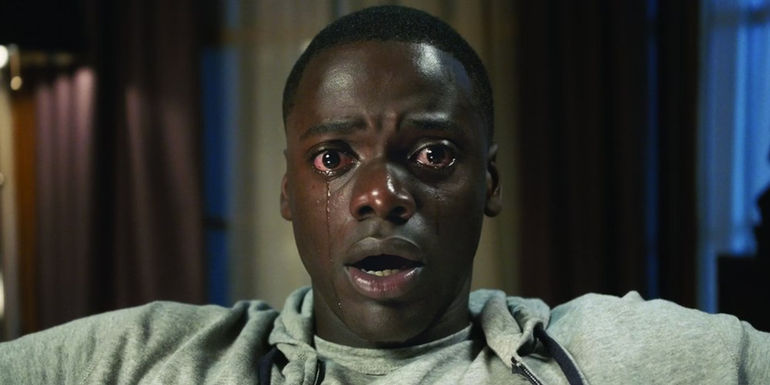 Chris looking shocked in Get Out