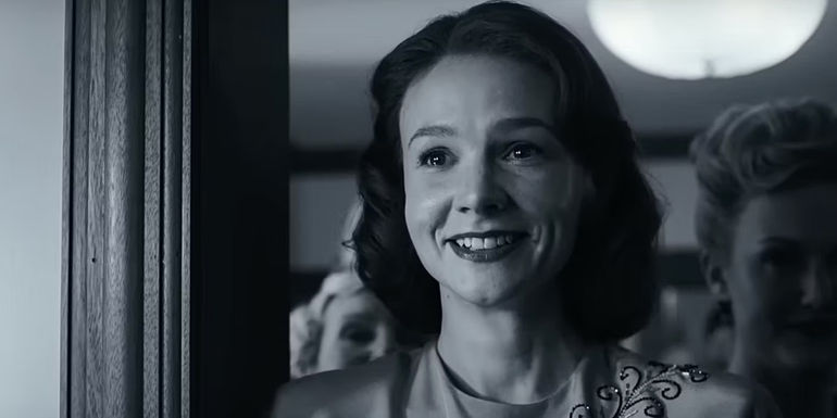 Carey Mulligan as Felicia Montealegre smiling wih joy in in Maestro