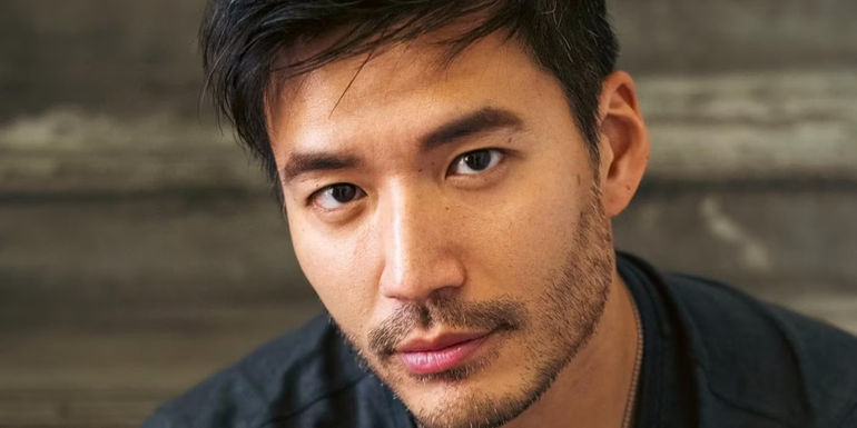 kevin kreider bling empire posing in black shirt necklace CROPPED