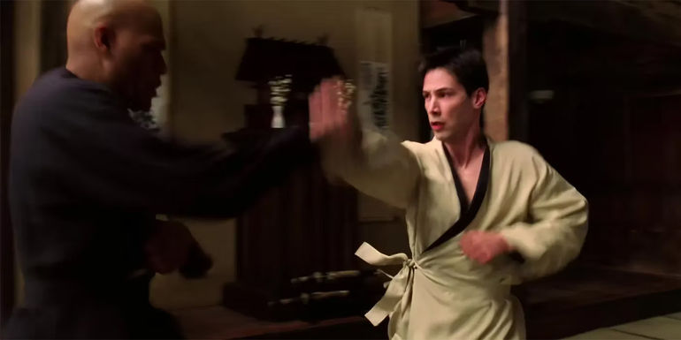 Neo fighting Morpheus in The Matrix