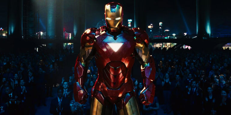 An image of Tony Stark in Iron Man armor placed over a scene at the Stark Expo in Iron Man 2