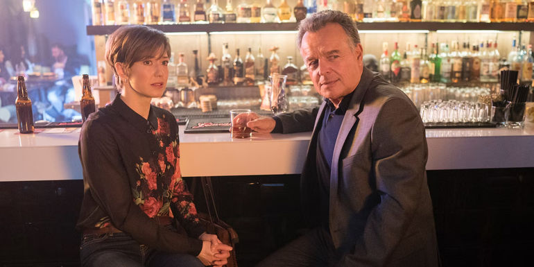 Carrie Coon and Ray Wise at the bar in Fargo Season 3