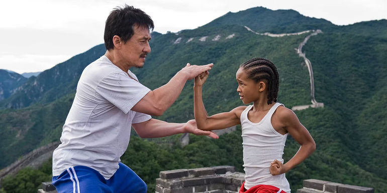 Jackie Chan as Mr. Han and Jaden Smith as Dre Parker training above the Great Wall of China in The Karate Kid 2010