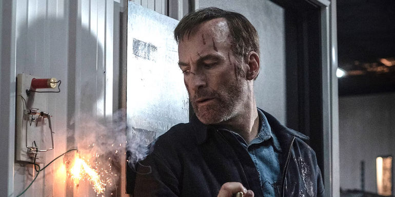 Bob Odenkirk as Hutch looking concerned in Nobody