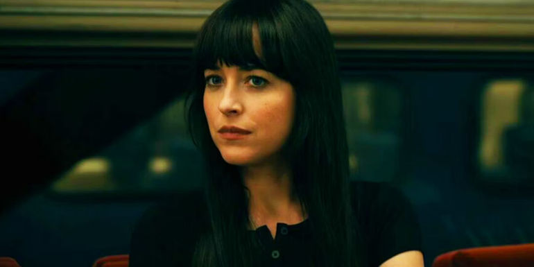 Cassandra Webb on a train in the Madame Web trailer