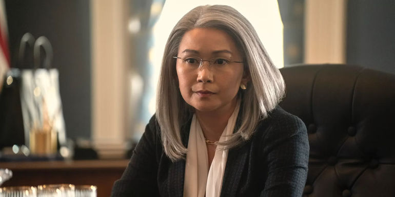 Diane sits in the White House in The Night Agent season 1.