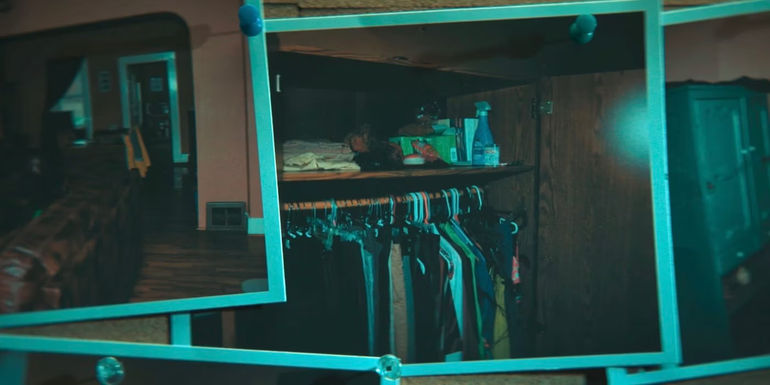 Investigative images of Cari's home pinned to a bulletin board. 