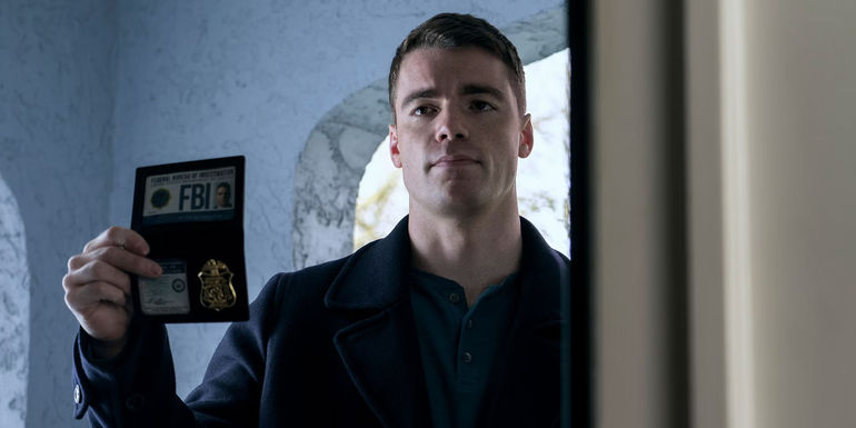 Peter pulls out his FBI badge in The Night Agent