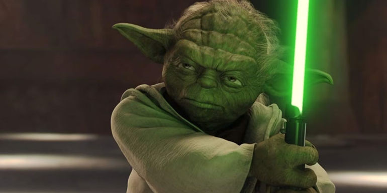 Yoda with a lightsaber in Attack of the Clones