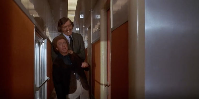 Gene Wilder's George manhandled by Richard Kiel's Reace in Silver Streak