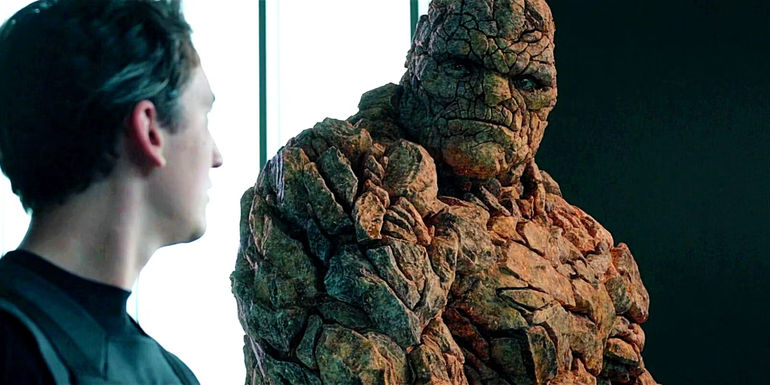 Jamie Bell as Ben Grimm aka The Thing In 2015's Fantastic Four Staring At Miles Teller As Reed Richards