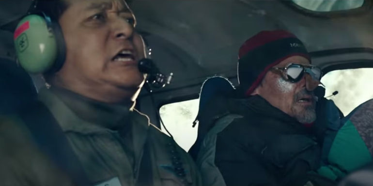 Vijay Lama's Lt. Col. Madan pilots a helicopter as Josh Brolin's Beck Weathers looks on in Everest
