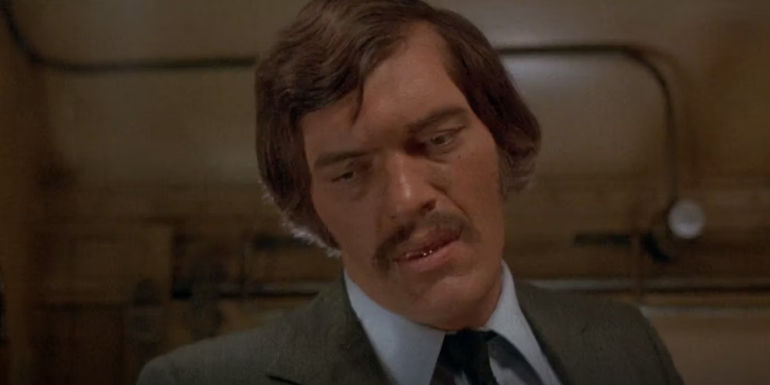 Reace (Richard Kiel) searching the train in Silver Streak
