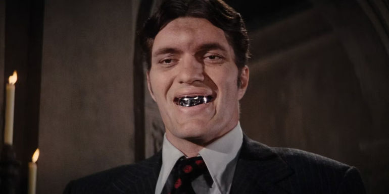 Richard Kiel's Jaws smiling with metal teeth in The Spy Who Loved Me
