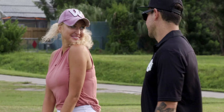 90 Day: The Single Life star Natalie Mordovtseva and Josh Weinstein smiling outside