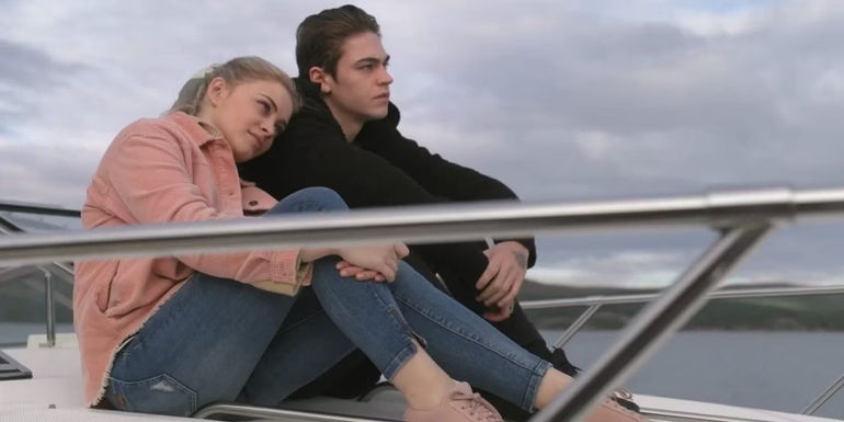 Tessa leaning her head on Hardin's shoulder in After We Fell
