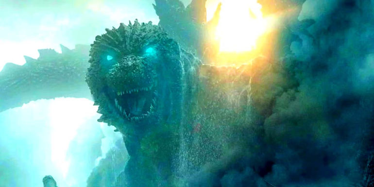 Godzilla roaring from a cloud of smoke with glowing eyes in Godzilla Minus One