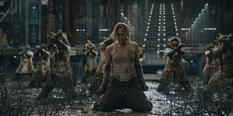 jennifer lopez & dancers kneeling in mud for this is me now